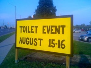 TOILET EVENT - AUGUST 15-16 sign at Home Depot