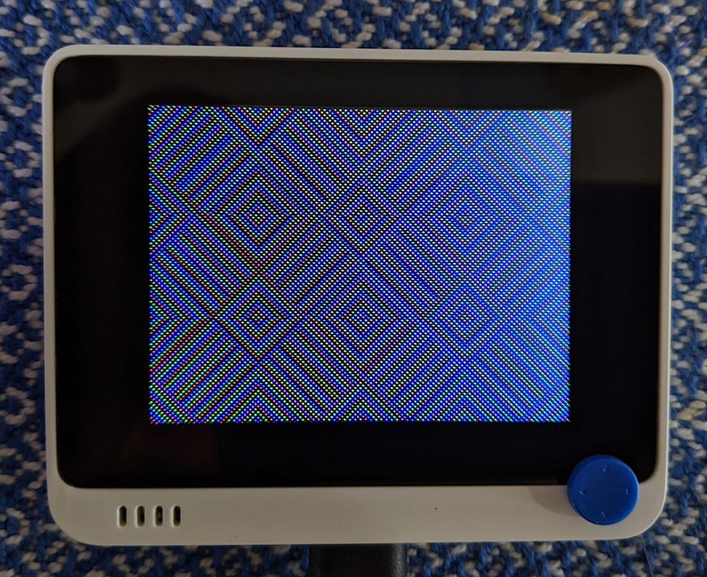 Small screen device showing geometric pattern